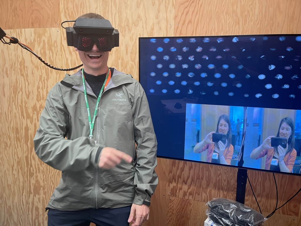 Thomas Czerniawski wearing a headset at a technology demo.